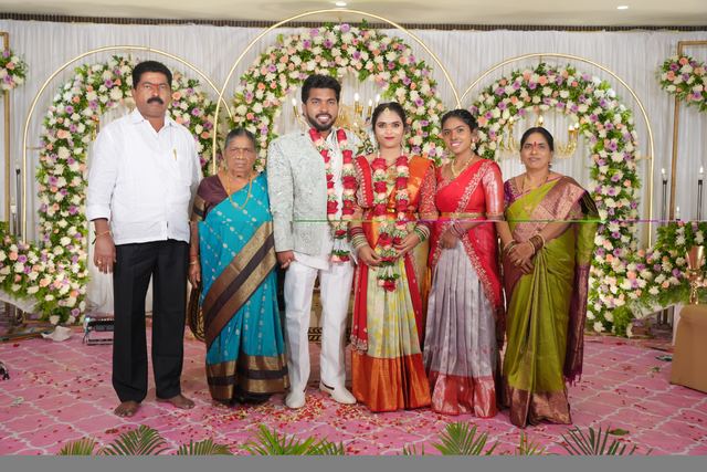 The two families on stage with Akhil and Rachana
